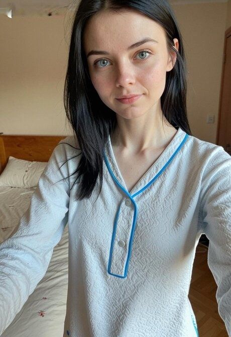 Nice teen with striking eyes exposes tiny tits in a bedroom setting - #4