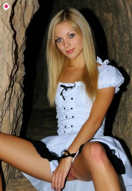 AI generated blonde with blue eyes gets mostly naked while in a cave - #7