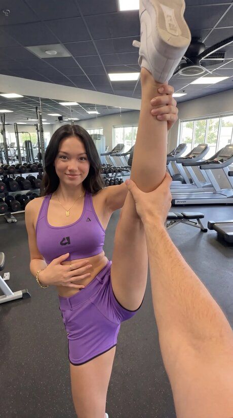 Cute Asian girl shows her flexibility while doing a solo workout - #9