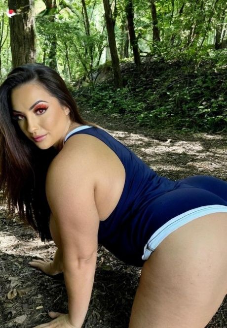 Chubby AI generated bombshell Avah bares her big boobs in the forest - #12