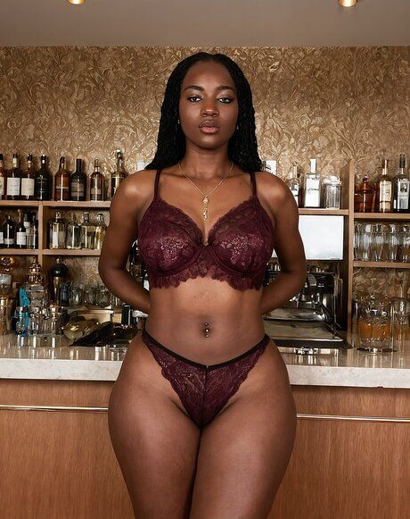 Pretty black girl models lingerie and clothes before standing naked at a bar - #3