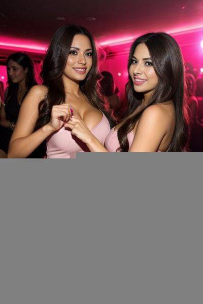 Busty latina brunette, long hair, smiling, wearing a pink dress, dancing with her blonde friend, wearing high heels, at a club - ai-porn.ai on pornsimulated.com